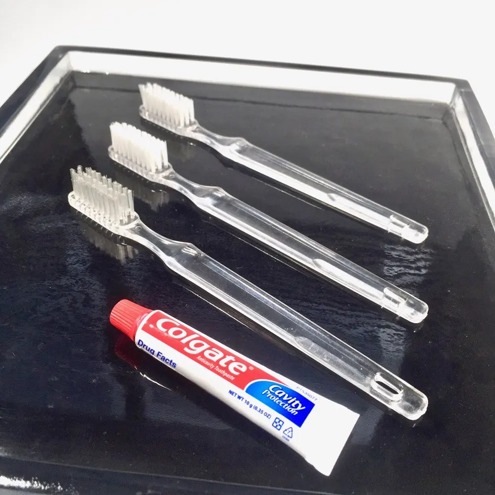 लक्जरी होटल डिस्पोजेबल टूथब्रश टूथपेस्ट के साथ उच्च गुणवत्ता वाले प्लास्टिक टूथब्रश सस्ते होटल दंत चिकित्सा किट