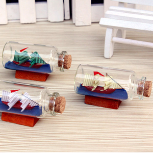 Mini Botellas <span class=keywords><strong>de</strong></span> <span class=keywords><strong>Vidrio</strong></span> Transparentes para Mensajes <span class=keywords><strong>de</strong></span> Deseos con un <span class=keywords><strong>Barco</strong></span> - Product Image 1