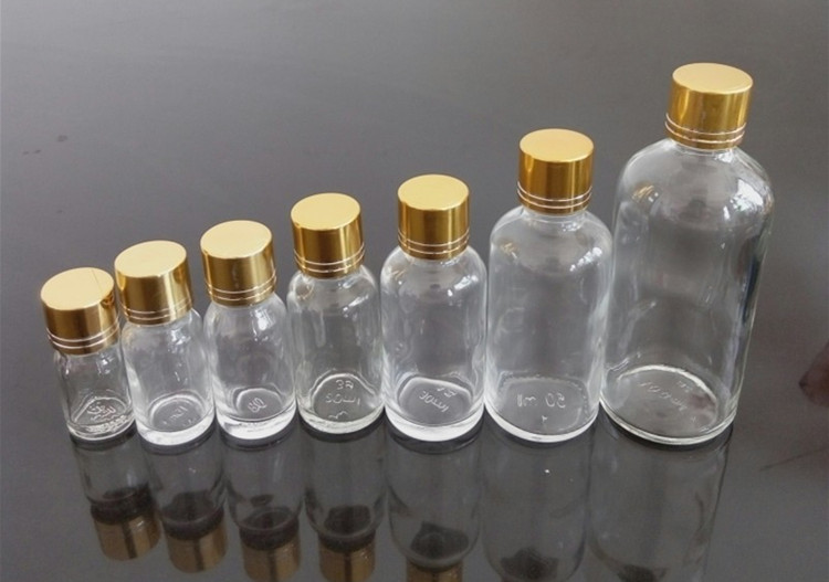 Customized clear medicine bottle for liquid glass medicine bottle with plastic lid