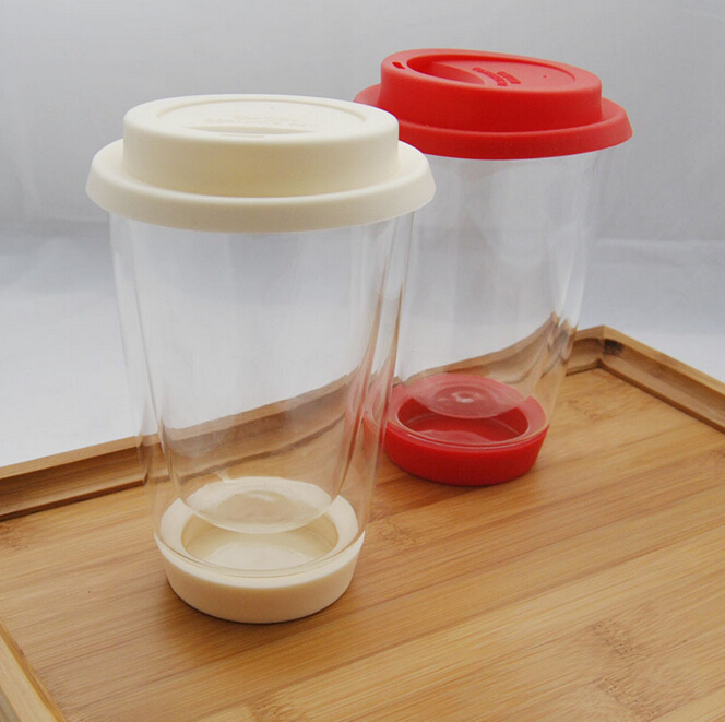 Double wall glass coffee cup with silicone base and lid