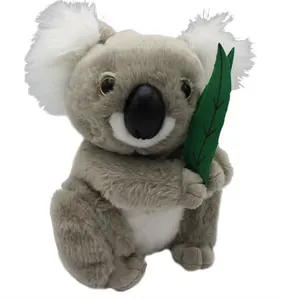 Medium sized koala soft toy holding leaves. Super soft and cuddly with cute smiling face