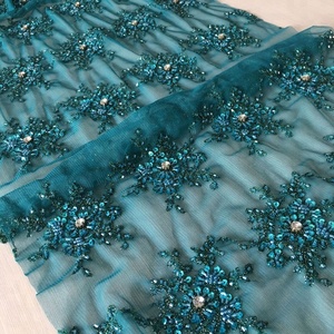 Tissu en dentelle de tulle uni brodé à la machine avec de lourds cristaux et strass pour robes de mariée et chaussures - Product Image 2