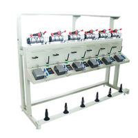 Machine à enrouler le fil textile de cône à cône avec tambour d'enroulement
