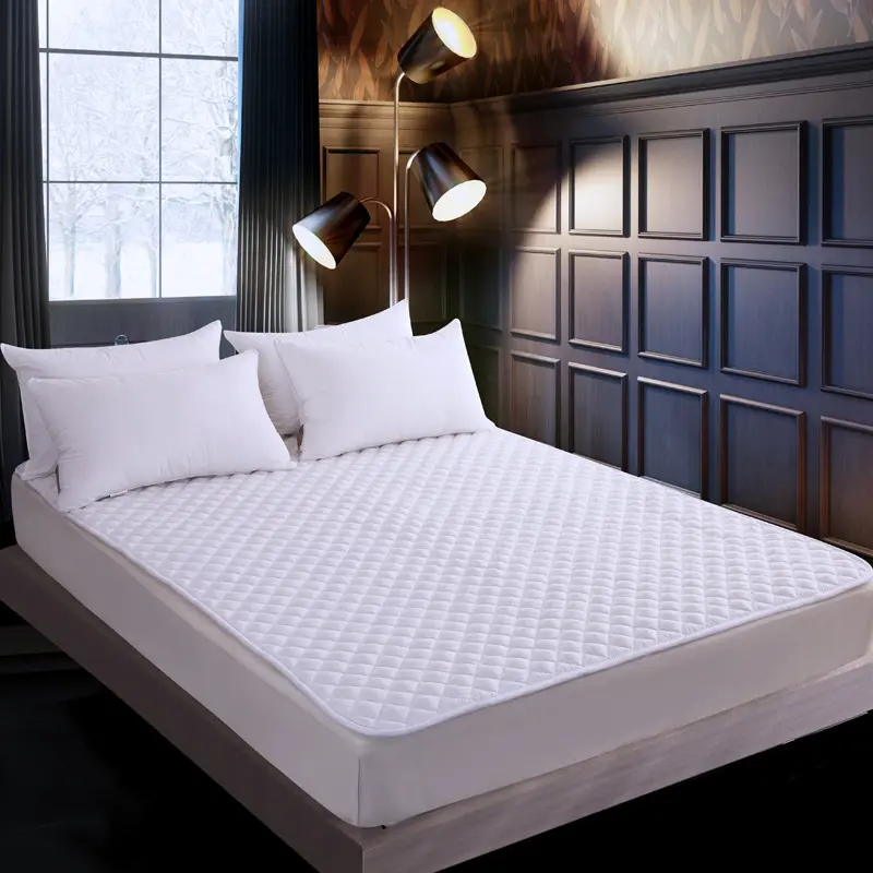 ผ้าคลุมที่นอนแบบพอดีกับเตียง,ที่ป้องกันที่นอนสีขาวของโรงแรม