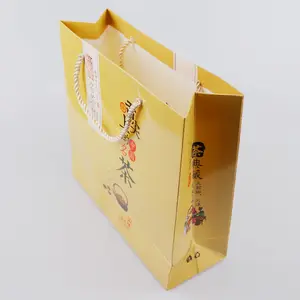 2019 Guangzhou fábrica de impresión directamente a medida blanco polka dot morir corte de papel regalo bolsa laminada de impresión