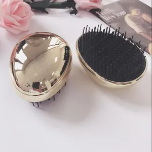 Tùy Chỉnh Hình Dạng Trứng Nhỏ Gọn Lược Detangling Bàn Chải Rose Gold Ma Thuật Massage Bàn Chải Tóc