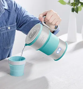 Travel Kettle 600ミリリットルDual Voltage Food Grade Silicone Electric Portable KettleとHot Selling