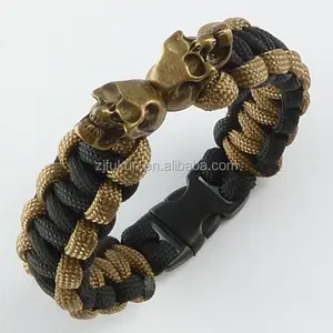 double skull charms in antique bronze color plastic buckle survival paracord bracelet