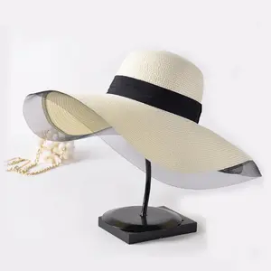 Cappello di paglia bevente floscio della spiaggia di estate del cappello a tesa larga della paglia a buon mercato all'ingrosso delle donne con la maglia decora