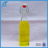 Bouteille en verre vide de 500 ml (17 oz) pour liqueur avec bouchons hermétiques en caoutchouc