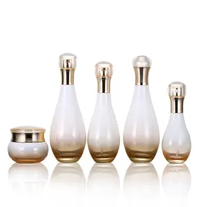 Benutzer definiertes Logo Bowling form Farbverlauf goldene Galvanik glasflasche und Glas 150ml 100ml 60ml 30g 50 Kosmetik behälter verpackung