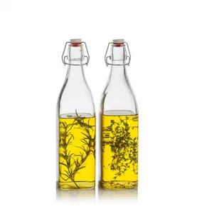 Botella de Vidrio Roja con Tapa Abatible Giara de 1 Litro - Botella de Vidrio Roja Ecológica para Cordiales y Conservas de <span class=keywords><strong>Bormioli</strong></span> <span class=keywords><strong>Rocco</strong></span> - Product Image 1