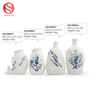<span class=keywords><strong>Vase</strong></span> <span class=keywords><strong>à</strong></span> fleur en <span class=keywords><strong>porcelaine</strong></span> peint <span class=keywords><strong>à</strong></span> la main de haute qualité <span class=keywords><strong>à</strong></span> motif de coquille de cheval de mer bleu pour la décoration intérieure - Product Image 2