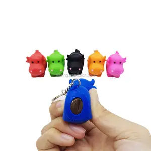 New design colorful soft pvc squeeze pom pom keychain toys