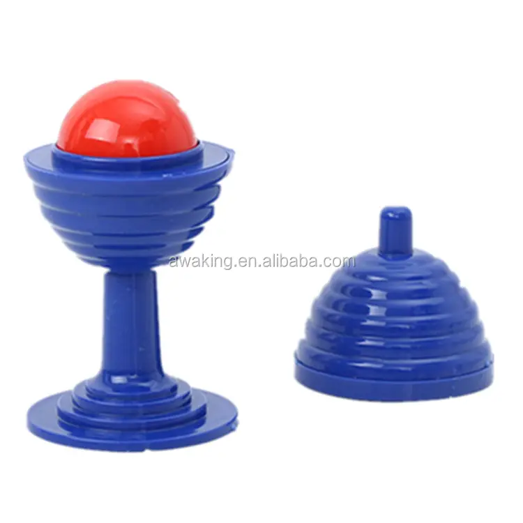 Various size ball and vase magic trick