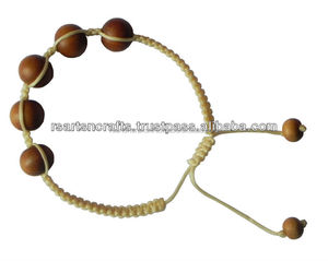 Pulsera de cuentas de sándalo redondas talladas religiosas para uso espiritual Cuentas de madera Premium - Product Image 3
