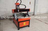 Routeur CNC rotatif en fonte de fer 6090 Jinan JCUT avec collecteur de poussière