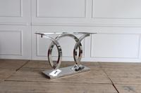 Table console moderne avec base en acier inoxydable brillant de couleur brune et finition antique, plateau en bois pour salon et hôtel
