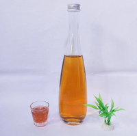 Fournisseur chinois Meilleur vendeur evian Bouteille d'eau minérale pour boisson Bouteille en verre d'eau gazeuse de source avec bouchon en alun 330ml