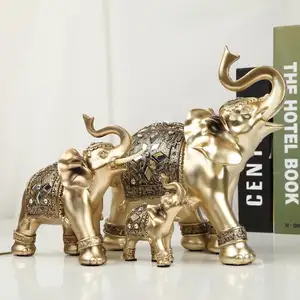 Casa decorativo de resina de fibra de vidrio indian colecciones antiguo oro animal estatua de elefante para mesa