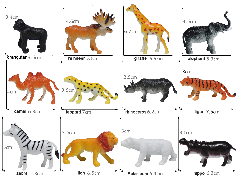 Gruppo di giocattoli di animali della giungla isolati su sfondo nero. Giocattoli di plastica per animali. Protezione dell'animale. Giocattolo per bambini Foto stock
