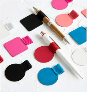 SELF-ADHESIVE LEATHER PEN HOLDER WITH ELASTIC LOOP