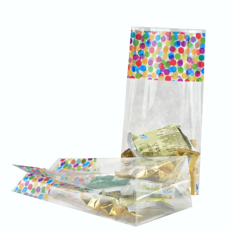 Commercio all'ingrosso trasparente di plastica della caramella cibo imballaggio DEL sacchetto di OPP con il blocco di fondo