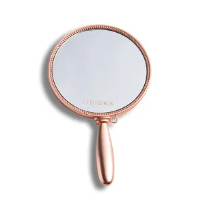 Produsen cermin emas mawar tangan kecantikan mewah menangani cermin dengan Logo kustom