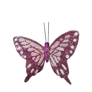 Intricately patterned glitter feather butterflies for spring holidays and wedding decorations