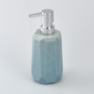 Bouteille de savon ronde en forme de cylindre en polyrésine de couleur orange - Product Image 4