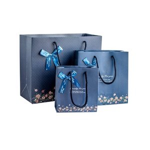 ropa de Boutique de regalo de embalaje de cartón de la corbata de moño decoración azul bolsa de papel con asa de cuerda - Product Image 1