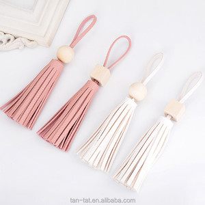 Decoración de borla de bolso de ropa de cuero genuino - Product Image 1