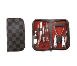 Voyage hommes femmes en acier inoxydable Kit d'outils de soin des ongles prix de gros manucure ongles ensemble dans un sac en satin - Product Image 6