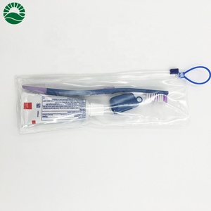 Brosse à dents en plastique avec capuchon en plastique et dentifrice emballés dans un sac en plastique pour brosse à dents - Product Image 2