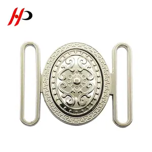 Factory wholesale custom pearl nickel metal belt buckle makers manufacturers for Female models down jacket