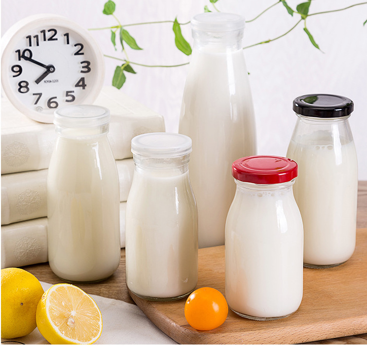 Haonao customized capacity clear small glass milk bottle with metal screw lid