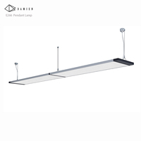 Suspension style Lampes luminescentes supérieures et inférieures faites Damien