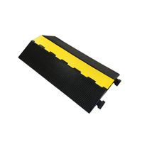 Protector de Cables de Goma y PVC Amarillo+Negro de Alta Resistencia de 1 Canal con Protección Antipresión para Uso en Concreto a 10-15 mph