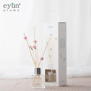 Trade assurance eyun pink flower glass bottle aroma oil reed diffuser with rattan stick