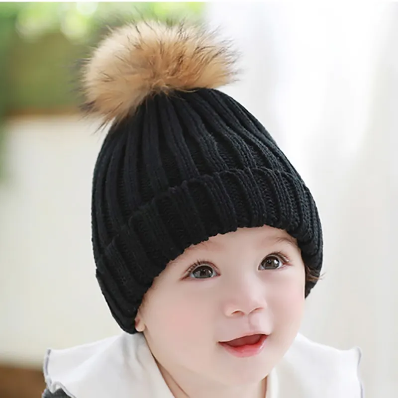 아이 면 손 뜨개질을 한 모직 모자 형식 겨울 모자 및 pom를 가진 모자