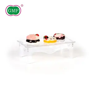Mesa elegante transparente de grado alimenticio, plato de postre de plástico con forma de moda, venta al por mayor
