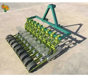 Small agricultural tractor used for vegetable garden lettuce radish seed planter
