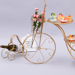 Precio de fábrica Placa de postre de metal dorado soporte de exhibición de bicicleta para soporte de pastel boda