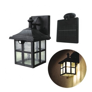 Lámpara de vidrio impermeable para exteriores, farol de pared Solar de 2W con detector de movimiento de Metal