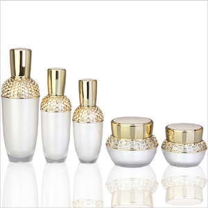 Luxury golden pattern jar low quantity acrylic plastic cosmetic cream packing jar/bottle with pump/sprayer 30ml 50ml 100ml
