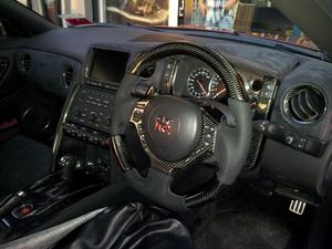 แผงสวิตช์พวงมาลัยคาร์บอนไฟเบอร์ป้องกันรังสียูวีสำหรับ GTR R35 พร้อมลายทอธรรมดา/ลายทวิล และผิวเคลือบด้าน/เงา - Product Image 6