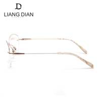 Monturas de gafas de titanio al por mayor en stock, gafas de diseño sin montura para mujer