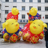 Nouvel an décoration personnalisée gonflable géant Attrayant cochon volant gonflable cochon jaune avec aile impression de logo Gratuite