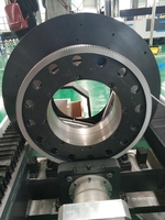 Machine de découpe laser à fibre CNC 4 axes haute précision Rbqlty 6000W pour tôles et tubes métalliques avec refroidissement par eau