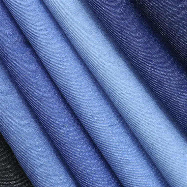 Venta caliente 100% algodón suave cómodo de denim elástico de tela al por mayor stock jean/Vestido/bolso de hombro/Pantalones